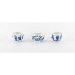 A pair of small Chinese blue & white cups, each painted with the Eight Immortals, apocryphal