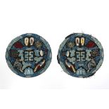 A pair of Chinese embroidered silk roundels, possibly rank badges, late 19th / early 20th century,