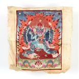 An early 20th century Tibetan embroidered silk thangka, unframed, 12 by 9ins. (30.5 by 23cms.).