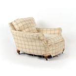 Property of a gentleman - an early 20th century upholstered club armchair, with deep seat.