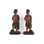 Property of a gentleman - a pair of late Victorian painted cast iron door stops or chimneypieces