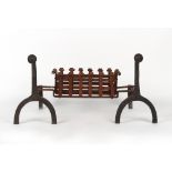 Property of a gentleman - a wrought iron fire basket, 33ins. (84cms.) wide (overall); together