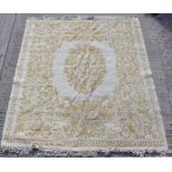 Property of a gentleman - an Indian hand knotted carpet with cream ground, 126 by 112ins. (320 by