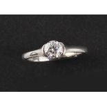 A platinum GIA certificated diamond single stone ring, the round brilliant cut diamond weighing 0.51