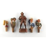 Property of a gentleman - a group of four Continental carved & painted wood novelty figural bottle