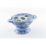 Property of a lady - a 19th century blue & white egg cup stand, 10.25ins. (26cms.) across handles.