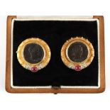 An unusual pair of 18ct yellow gold ruby & diamond earrings, with clip fastenings, each set with a