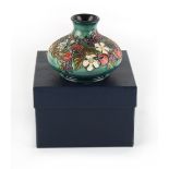 Property of a lady - a Moorcroft Carousel pattern squat vase, 4.3ins. (11cms.) high, in original