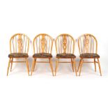 Property of a lady - a set of four Ercol light elm fleur de lys dining chairs, model 878 (4).