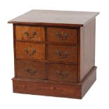 Property of a lady - an oak & pine bank of six drawers, 25.2ins. (64cms.) wide (overall), 23.