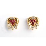 A pair of good quality 18ct yellow gold ruby & diamond earrings of floral form, each set with