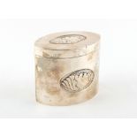Property of a gentleman - an Edwardian silver tea caddy, of navette section with repousse shell