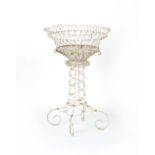 Property of a lady - an early 20th century white painted wire plant stand, 33ins. (84cms.) high.