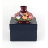 Property of a lady - a Moorcroft Pansies pattern squat vase, 4.3ins. (11cms.) high, in original box.