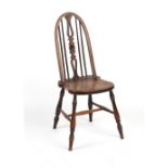 An unusual 19th century Windsor side chair, with narrow hoop back & roundel centred splat above a
