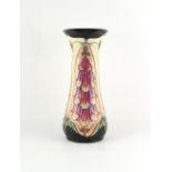 Property of a lady - a Moorcroft Foxglove pattern waisted vase, 11.95ins. (30.3cms.) high, in