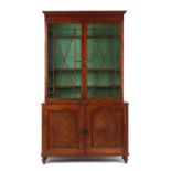 Property of a lady - a mahogany two-part chiffonier bookcase, parts 19th century, the top & sides of