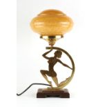 Property of a gentleman - an Art Deco style brass & brown bakelite figural table lamp, with