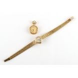 Property of a lady - a lady's Indus 14ct yellow gold cased mechanical wristwatch on 14ct gold