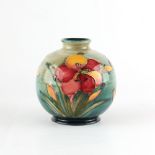 Property of a lady - a Moorcroft Columbine pattern vase, with paper label 'Potter to the late