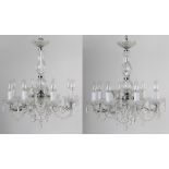 Property of a lady - a pair of modern moulded glass eight light electroliers or chandeliers, each