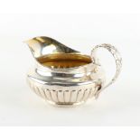 Property of a gentleman - a George IV silver milk jug, with acanthus handle, Rebecca Emes & Edward