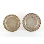 Property of a lady - two Indian white metal (tests silver) plates or waiters, each with engraved