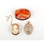 A 9ct gold mounted oval agate brooch, 58mm long; together with a 9ct gold framed pendant; and a 9ct