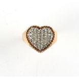 A 9ct yellow gold heart shaped pave set diamond ring, size M.