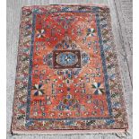 Property of a lady of title - a Turkish Caucasian design rug, 107 by 74ins. (272 by 188cms.).