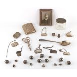Property of a deceased estate - a bag containing assorted small silver items including four Georgian