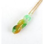 A carved jadeite pendant in the form of a vase, approximately 40mm long, on chain necklace.