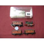 An 'N' Gauge 0-4-0 Steam Outline Continental Locomotive and Three Four Wheel Coaches, possibly by