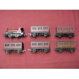 Hornby 'OO' Scale 0-4-0 Locomotive, finished in WCR maroon and five four wheel coaches, unboxed.