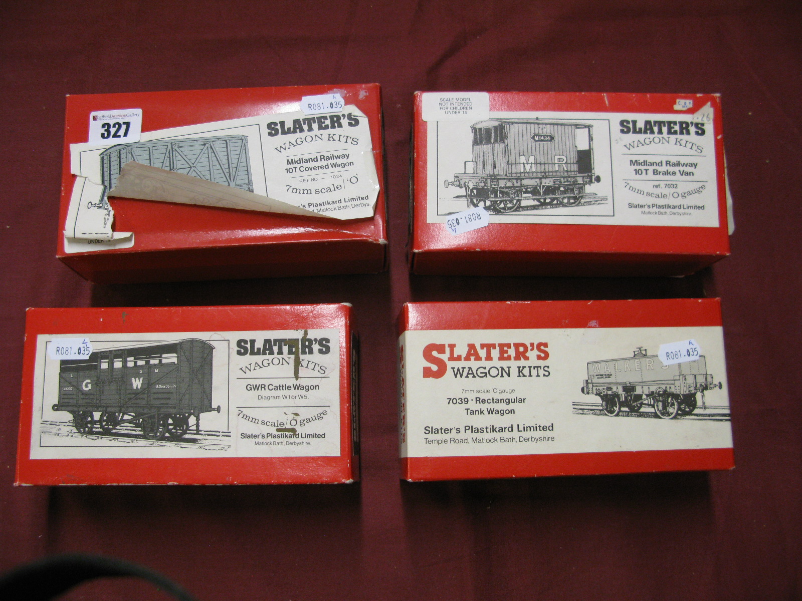 Four 'O'/7mm Scale Built Up Four Wheel Wagons by Slaters, including a Walkers rectangular tank