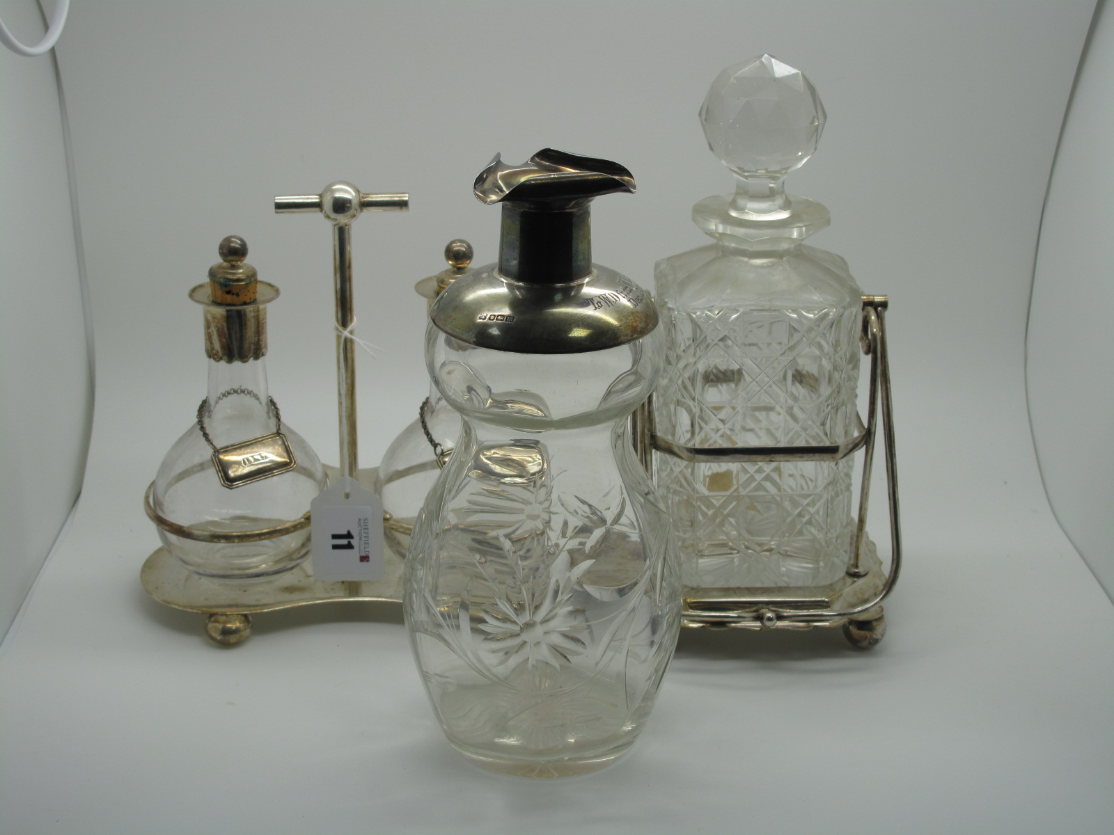 A Hallmarked Silver Mounted Glass Decanter, Sheffield 1904, "To W.D. from W.I. and H.W.B. Dec.