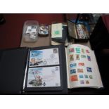 A Carton Containing a Junior Album of World Stamps, thirty one flown covers in a four ring binder