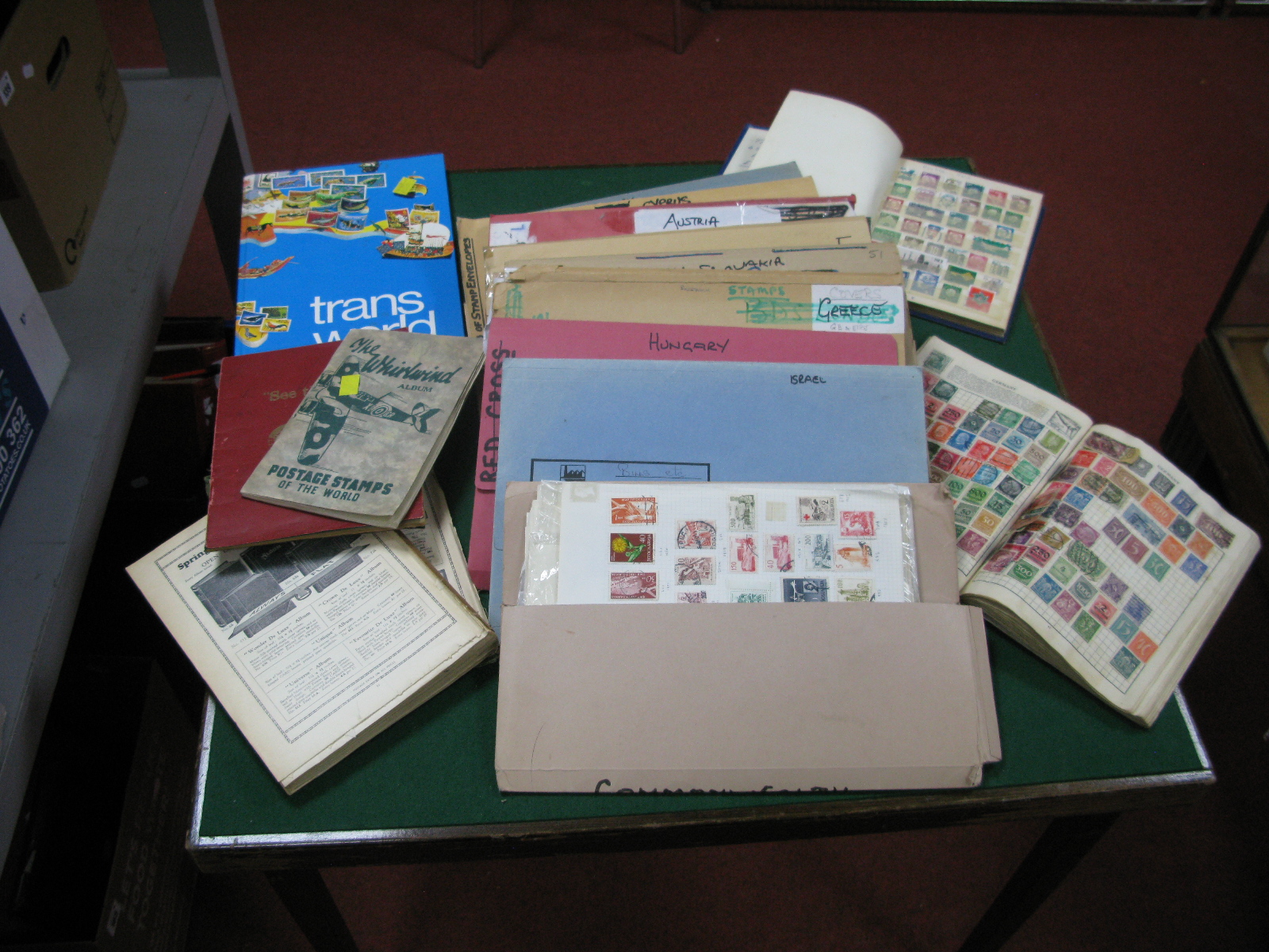 A Carton Containing European Stamps and Postal History in Folders, mint and used stamps and covers