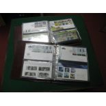 Two Folders Housing a Collection of Fifty Four FDC's, 2004-2005, with corresponding presentation