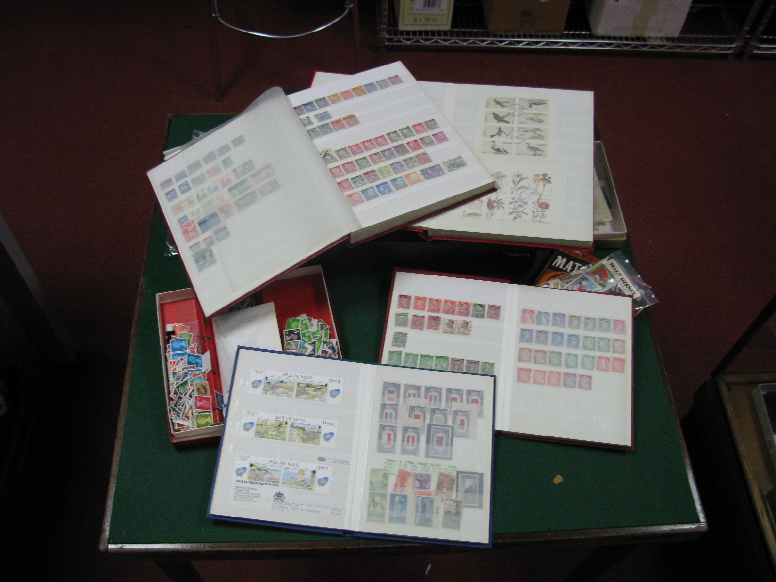 A Small Box Containing Four Stockbooks of Stamps Mint and Used with Thematic Interest, including