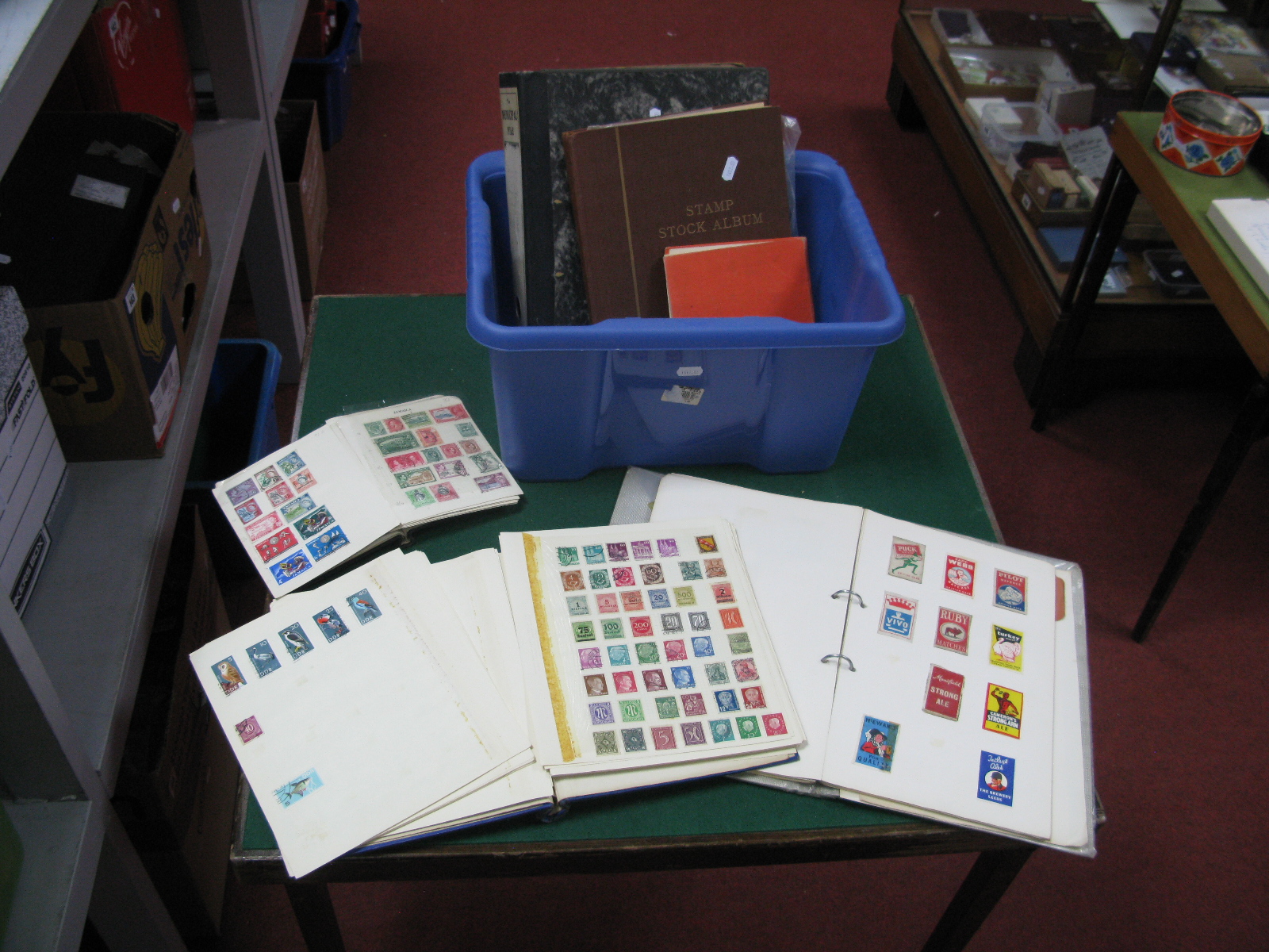 A Box with Six Stamp Albums of World Stamps, mixed condition but some useful material, George VI