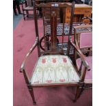 An Early XX Century Mahogany Inlaid Art Nouveau Chair, with a shaped top rail, central splat with
