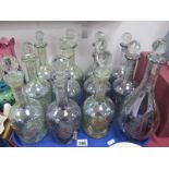 Twelve Glass Decanters with Stoppers.