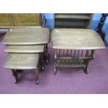 Ercol Nest of Tables, with trestle ends; together with an Ercol magazine rack. (2)