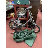 A Breeze Folding Electric Bicycle, in bag, (untested: sold for parts only).
