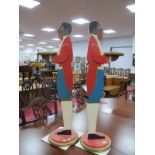 A Pair of Painted Wooden Freestanding Dumb Waiters, circa early XX Century, each as a Butler holding