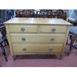 An Early XX Century Light Oak Chest of Two Short and Two Long Drawers.