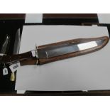 Bowie Knifen Made in Sheffield, coffin handle, 32cm blade, overall length 46cm, in brown leather