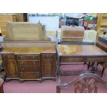 A Mahogany Sofa Table, together with a break fronted sideboard. (2)