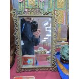 Early XX Century Freestanding Dressing Mirror, in pierced brass frame, 38.5cm high.